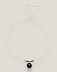 Collar midi con medalla dorada esmaltada en negro con palmera oro