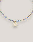 Collar cadena con cristales facetados azules engarzados con medallita de estrella nacar