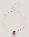 Collar midi con medalla dorada esmaltada en rosa con palmera oro