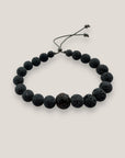 Pulsera con ojo de la suerte aborigen y lava gris oscuro