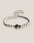 Pulsera tortuga plateada con lava blanca