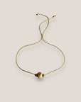 Pulsera minimal con bola 8mm de esponja coral verde olivina y separadores dorados con brillis de cristal blanco