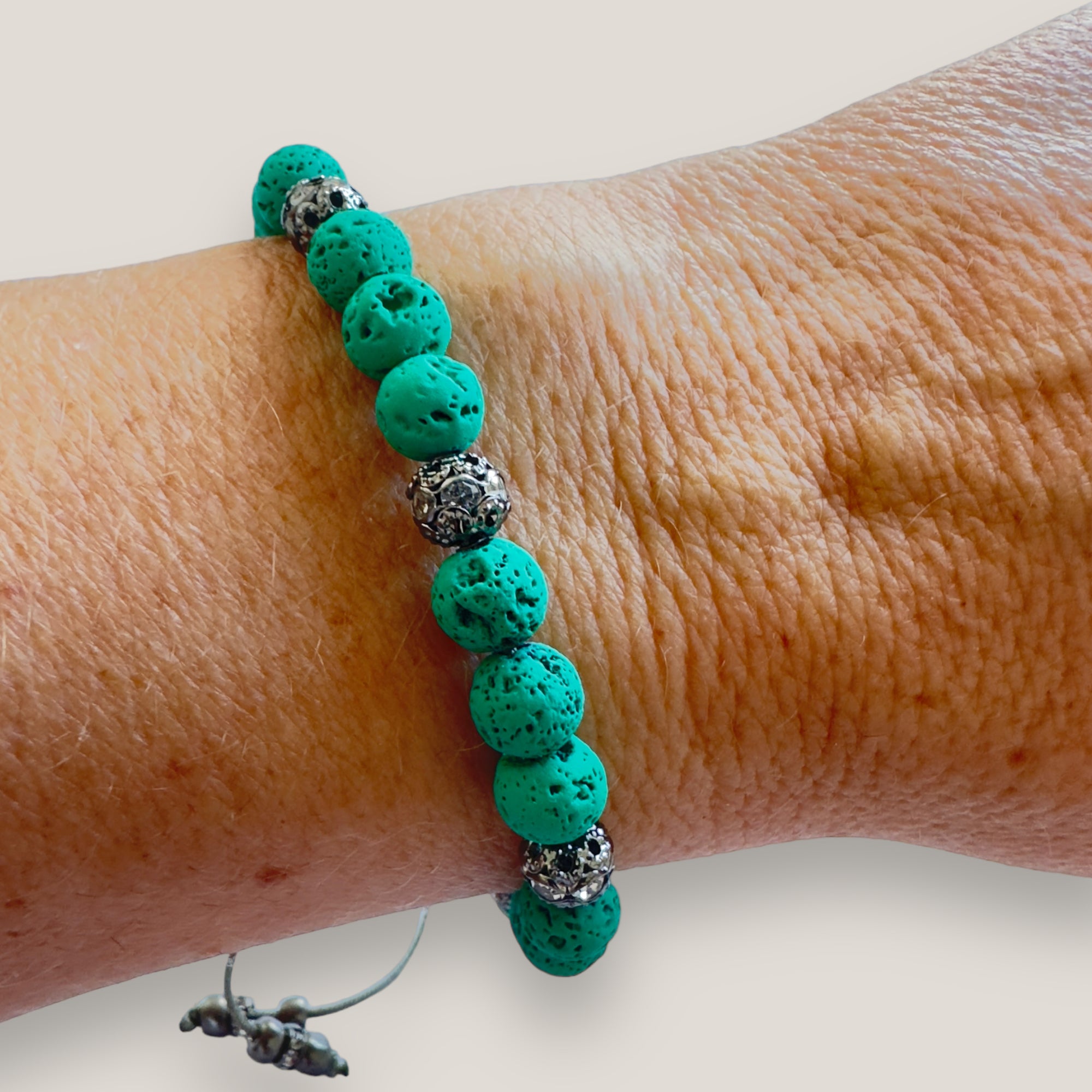 Bracelet with large golden turtle and colored lava