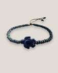 Pulsera con tortuga de cerámica azul marino con cuentas de cristal azul japeado