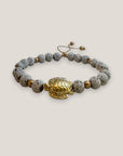 Pulsera con gran tortuga dorada lava blanca