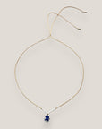 Collar midi con pulpo esmaltado azul con lunares blancos y abalorios blancos y dorado