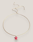 Collar minimal con estrella de howlita rosa fucsia
