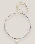 Collar cadena con cristales facetados azules engarzados con medallita de estrella nacar