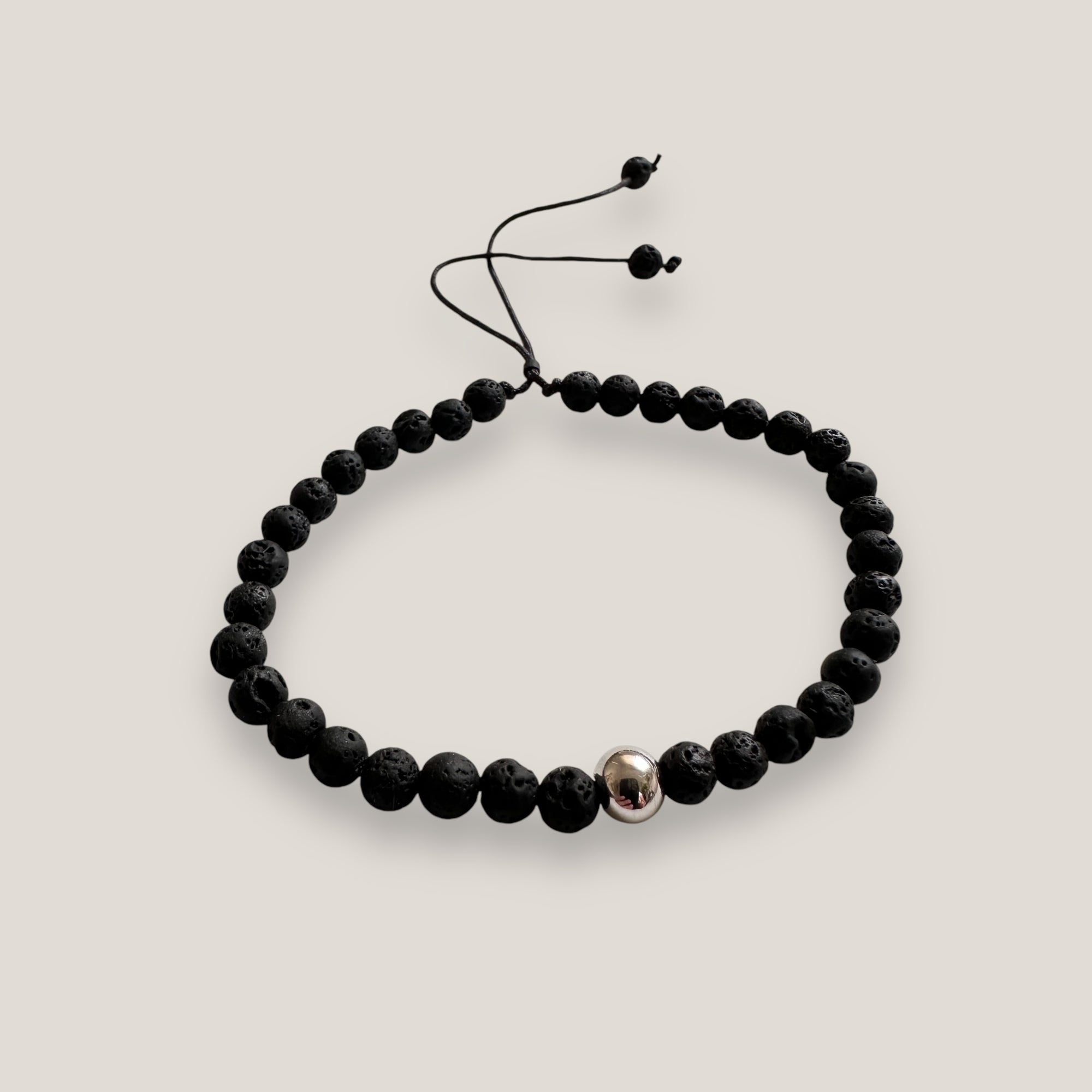 Armband mit Stahlkugel und schwarzer Lava