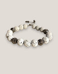 Pulsera super Dafne 10mm con lava blanca con filigrana gunmetal