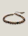 Pulsera Dafne con lava arena y filigrana bronce con cristalitos