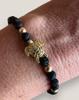 Bracelet with large golden turtle and colored lava