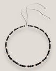 Collar mini Dafne perlas lava negra, rondeles gunmetal con cristalitos blancos