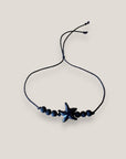 Pulsera Eloise midi con estrella howlita negra y cuentas de lava negra lo