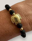 Bracelet with large golden turtle and colored lava