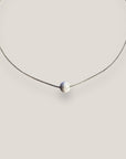 Collar minimal con bola 8mm de lava blanca