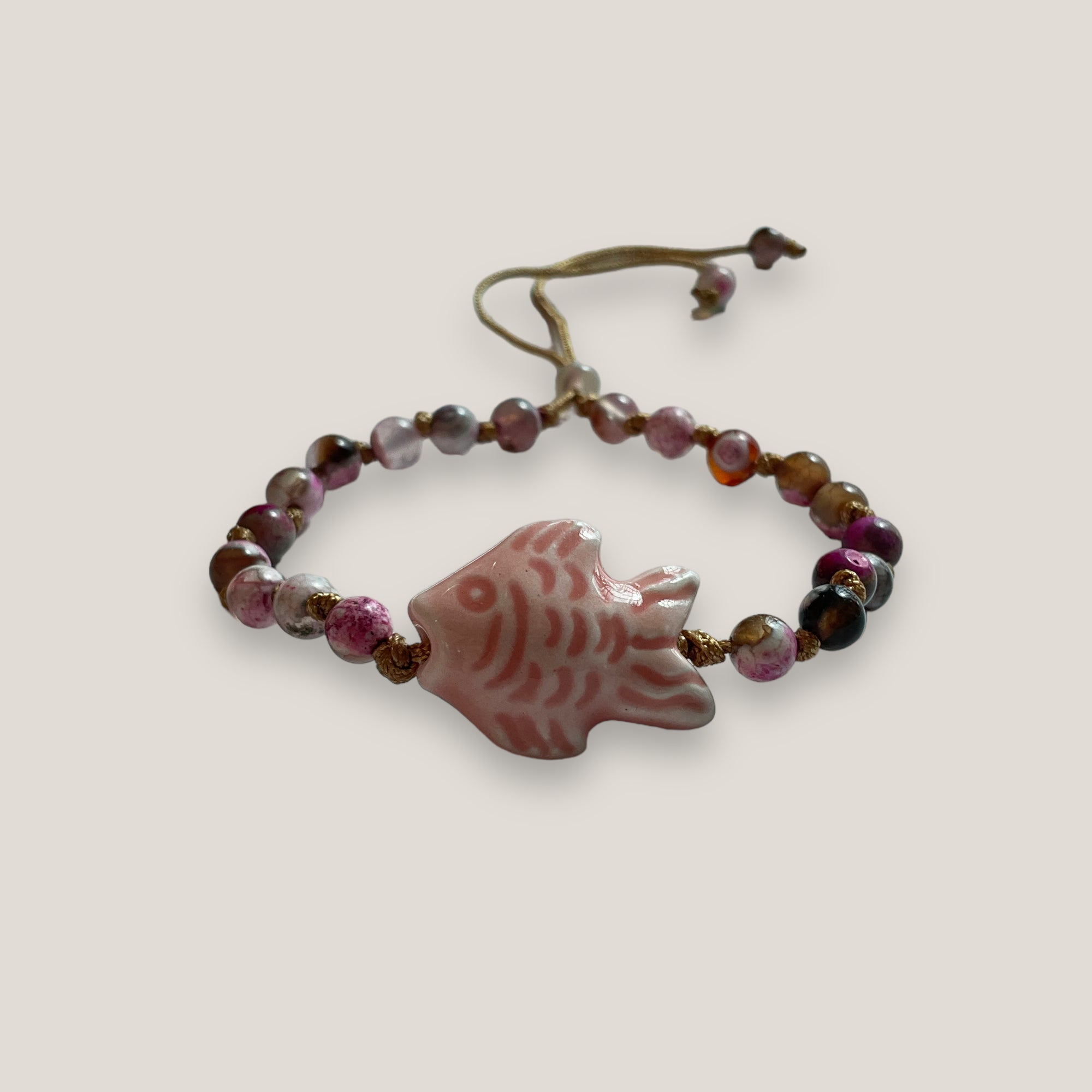 Bracelet with large golden turtle and colored lava