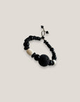 Pulsera ónix hueso gran cuenta esponja coral negra 20mm