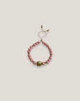 Armband mit großer goldener Schildkröte und rosa Lava
