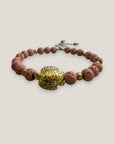 Armband mit großer goldener Schildkröte und rosa Lava