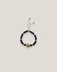 Pulsera con gran tortuga dorada lava azul oscuro
