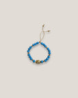 Pulsera con gran tortuga dorada lava azul azulín