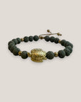 Pulsera con gran tortuga dorada lava gris claro