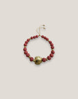 Pulsera con gran tortuga dorada lava fucsia