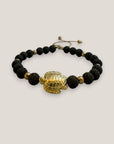 Pulsera con gran tortuga dorada lava marrón oscuro