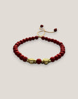 Armband mit goldenen Liebesschildkröten und roter Lava
