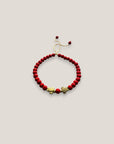 Armband mit goldenen Liebesschildkröten und roter Lava