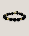 Pulsera base 10mm lava negra hematitas facetadas oro