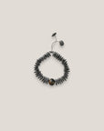 Pulsera cuenta piel cabra lajas de hueso