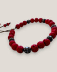 Pulsera Dafne con lava roja y filigranas bronce con cristalitoso