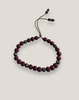 Pulsera Dafne con lava granate y filigrana bronce con cristalitos