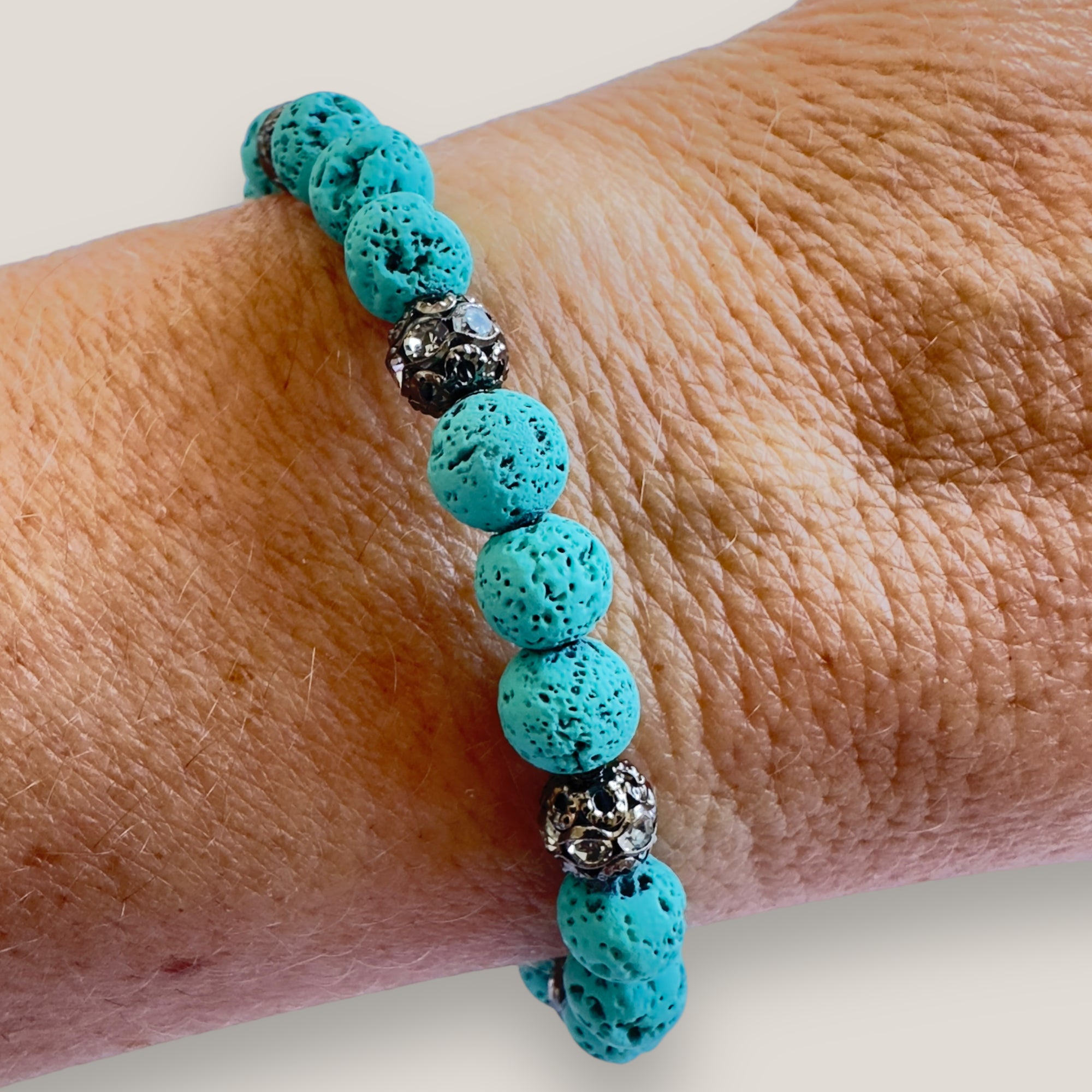 Bracelet with large golden turtle and colored lava