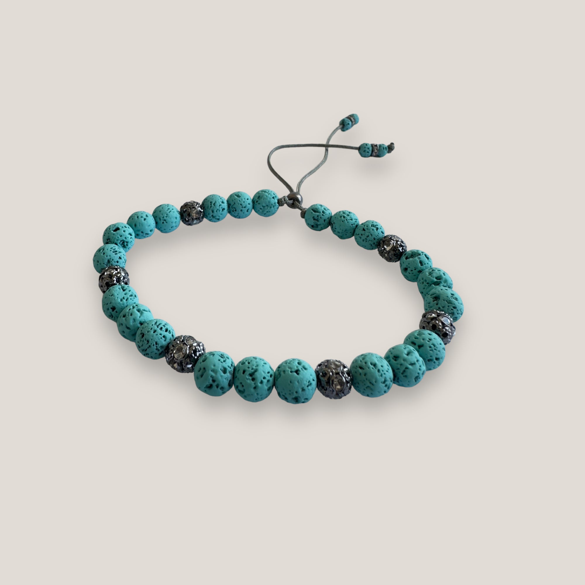Bracelet with large golden turtle and colored lava