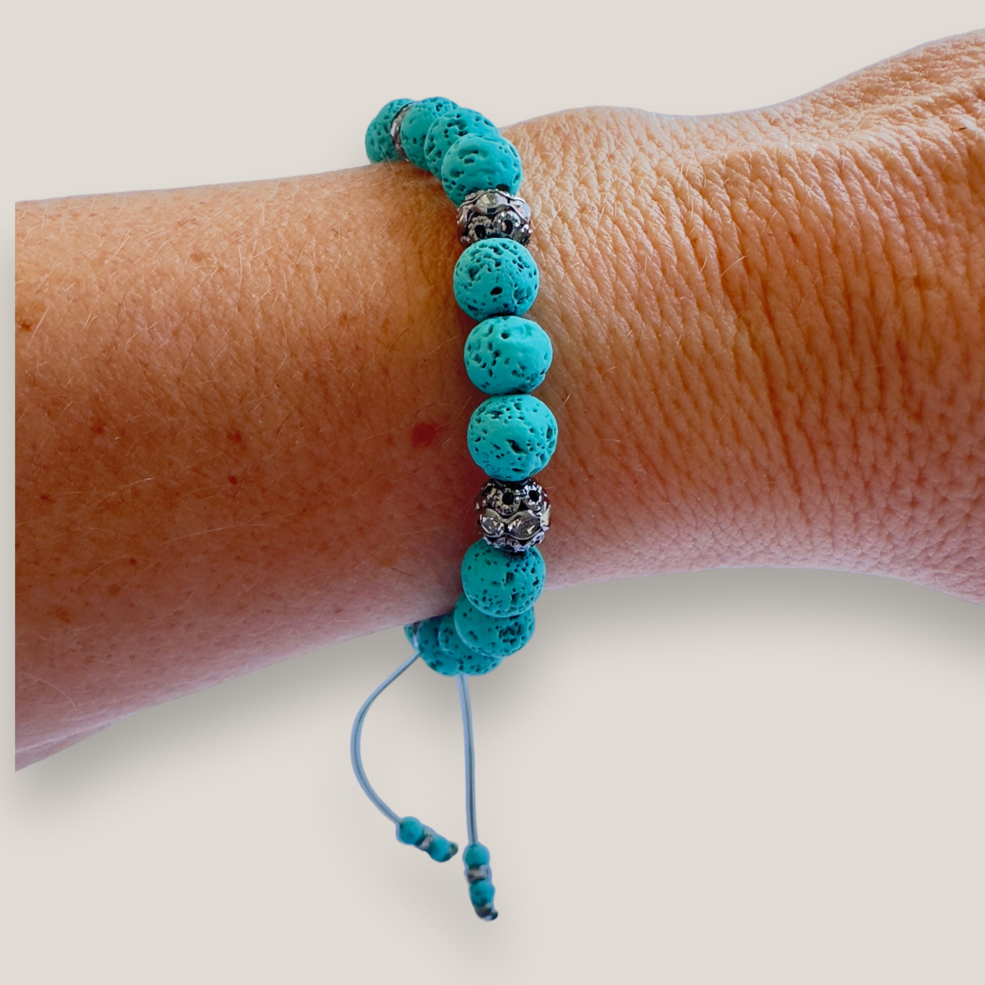 Bracelet with large golden turtle and colored lava