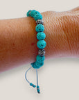 Bracelet with large golden turtle and colored lava