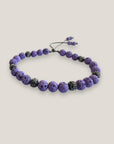Pulsera Dafne con lava malva y filigrana gunmetal con cristalitos