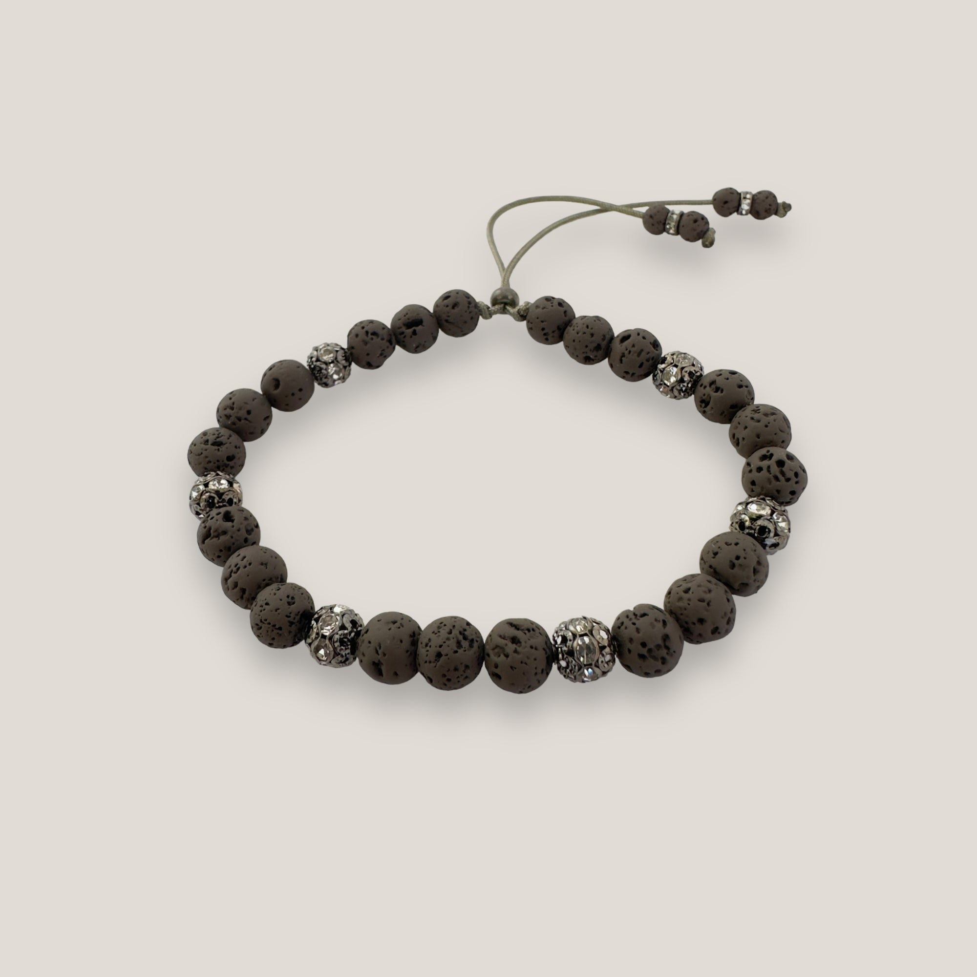Pulsera Dafne con lava marrón oscuro y filigrana gunmetal con cristalitos