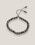 Pulsera Dafne con lava marrón claro y filigrana bronce con cristalitos