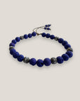 Pulsera Dafne con lava azul profundo y filigrana bronce con cristalitos