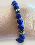 Pulsera Dafne con lava azul profundo y filigrana bronce con cristalitos