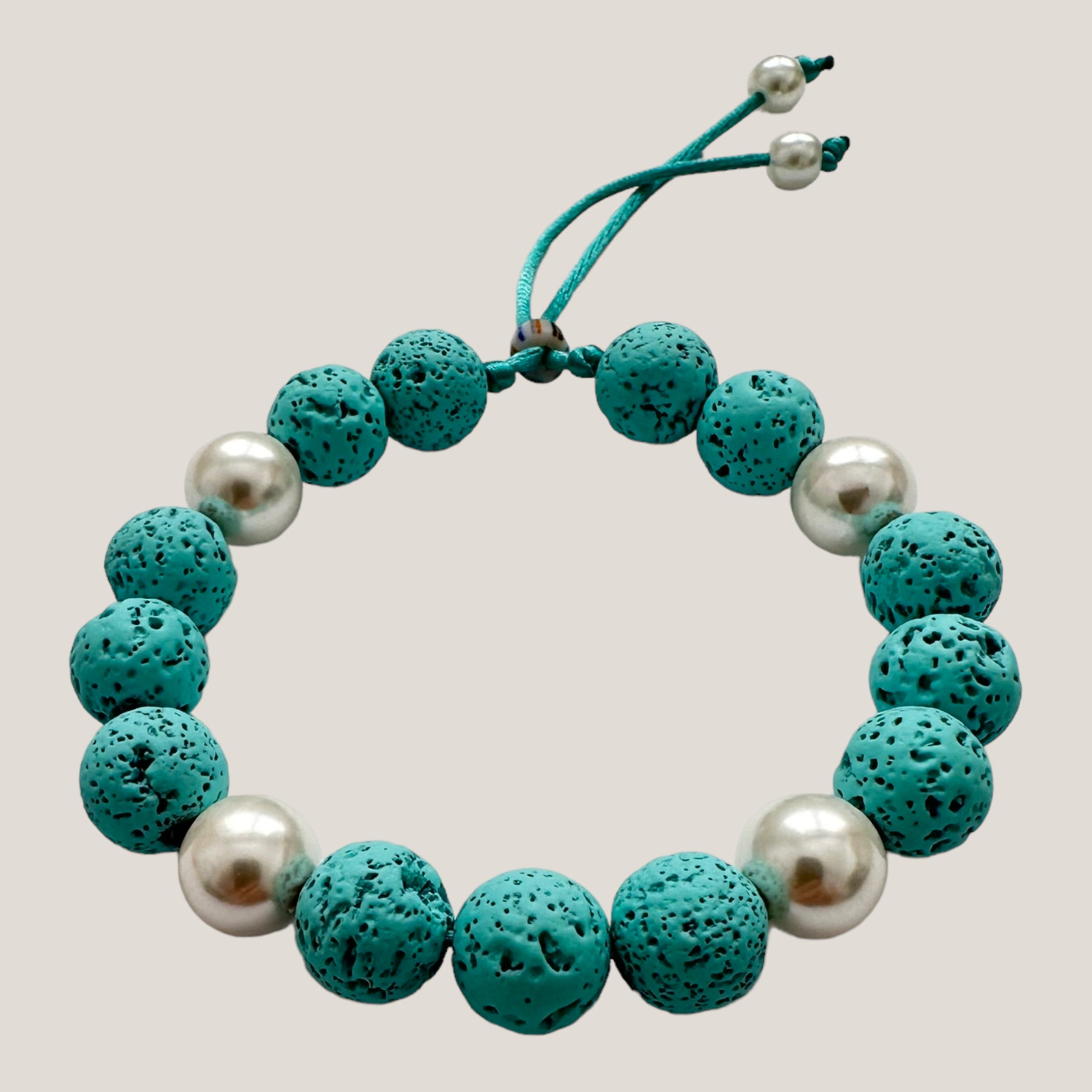 Bracelet with large golden turtle and colored lava