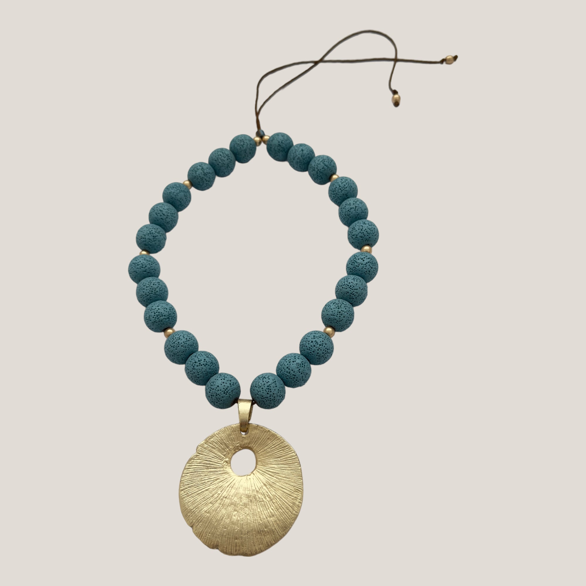 Maxi bracelet with golden turtle and colored lava