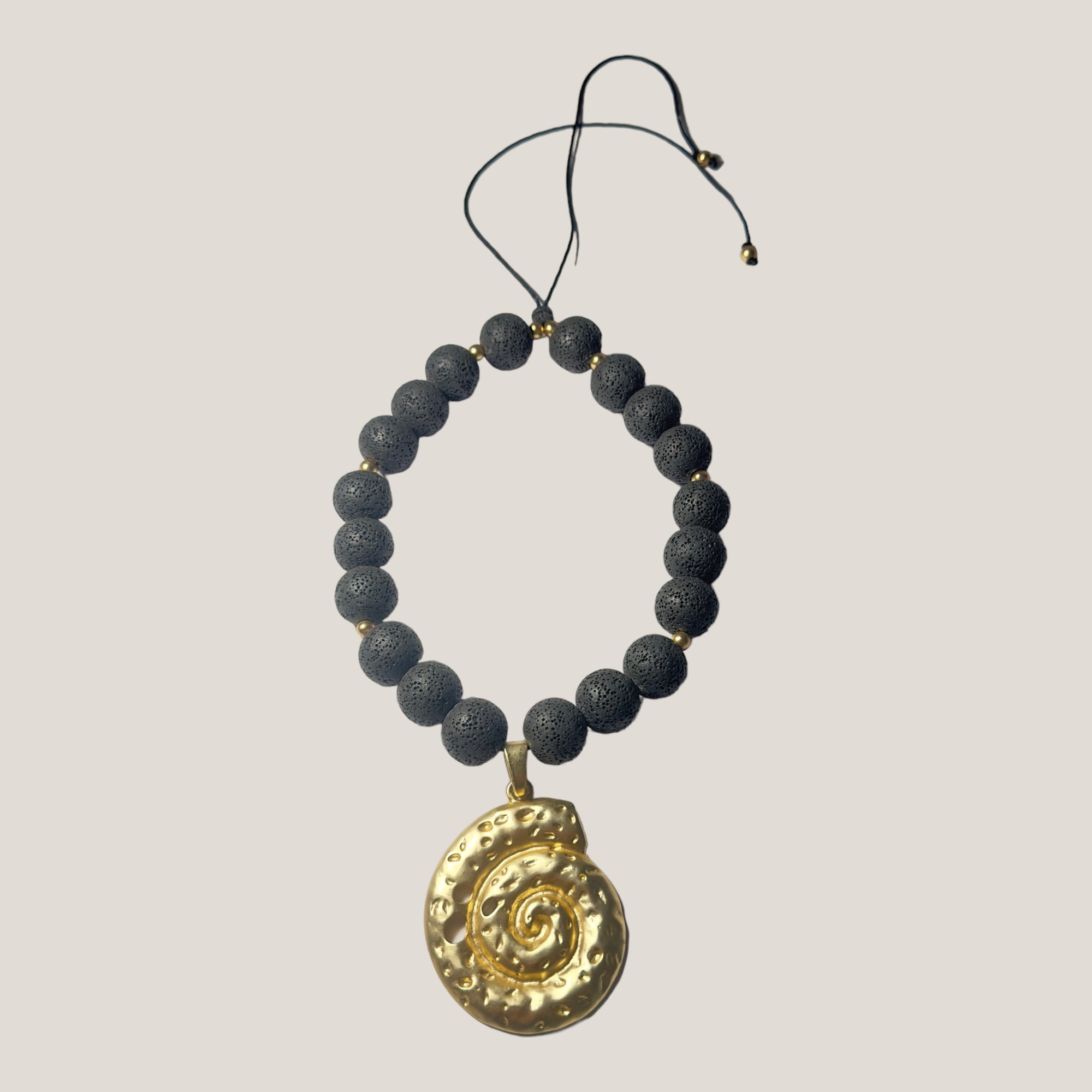 Maxi bracelet with golden turtle and colored lava