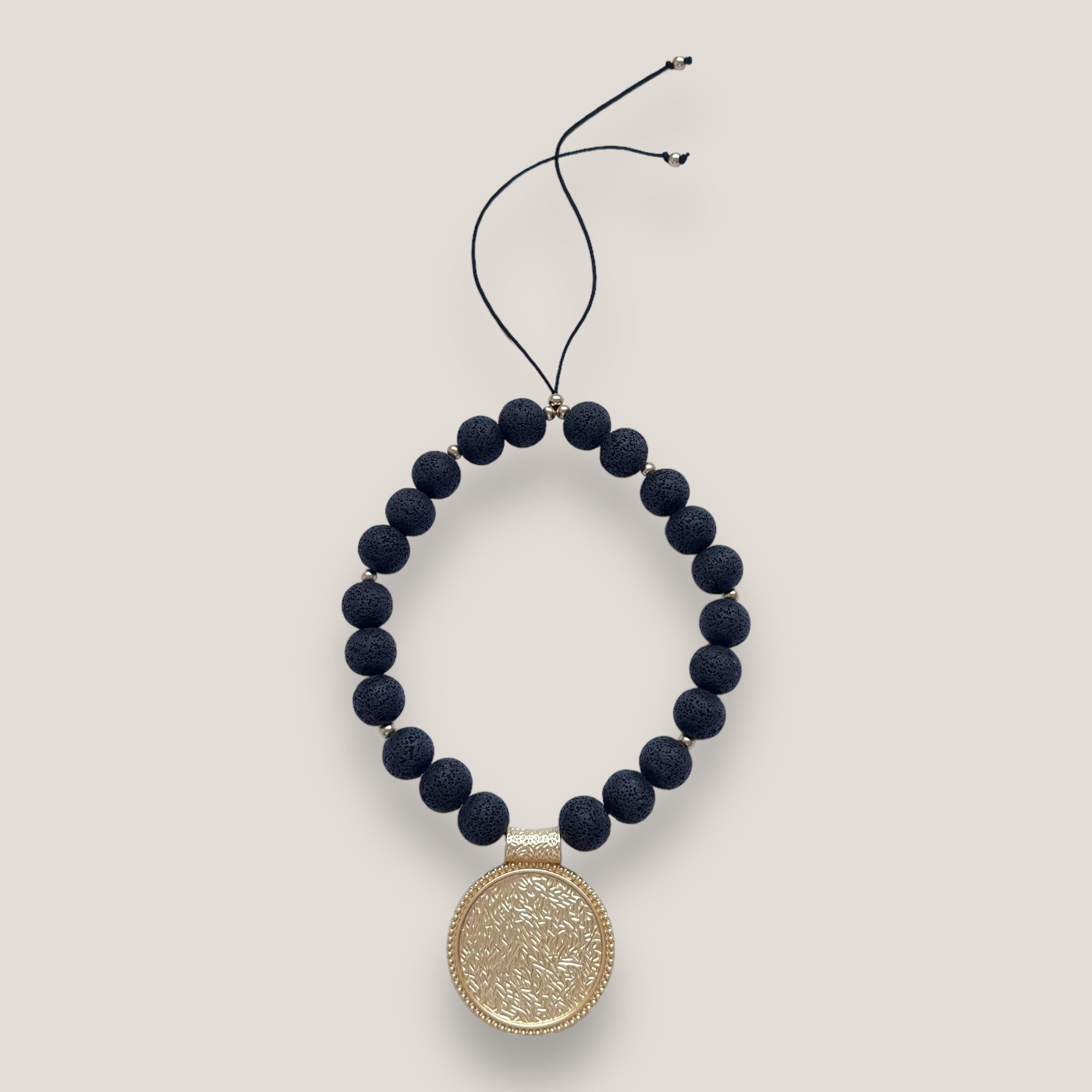 Maxi bracelet with golden turtle and colored lava