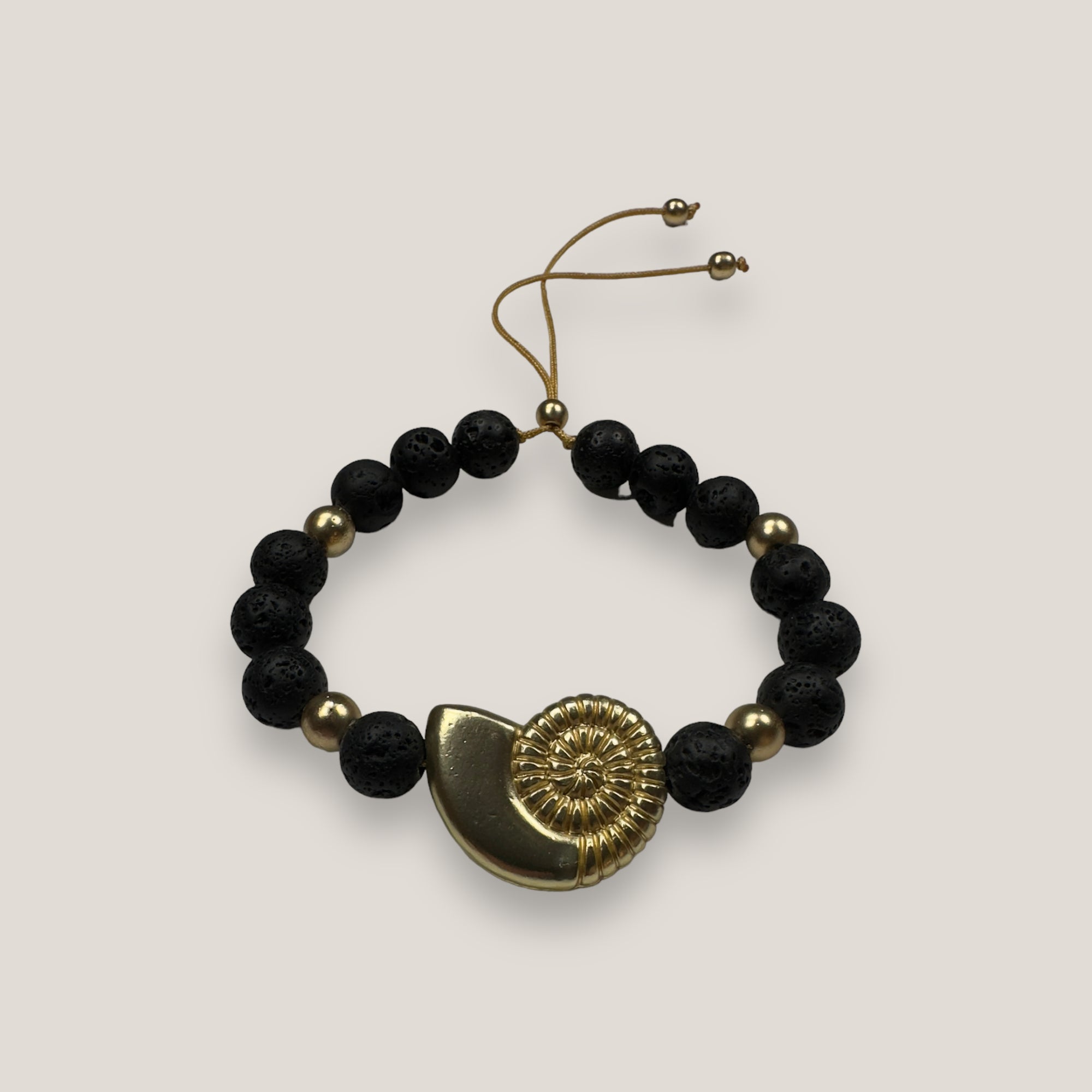 Bracelet with large golden turtle and colored lava