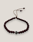 Pulsera con tortuguita plateada y lava granate